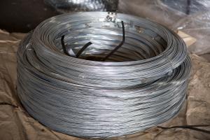 Tension wire in coil